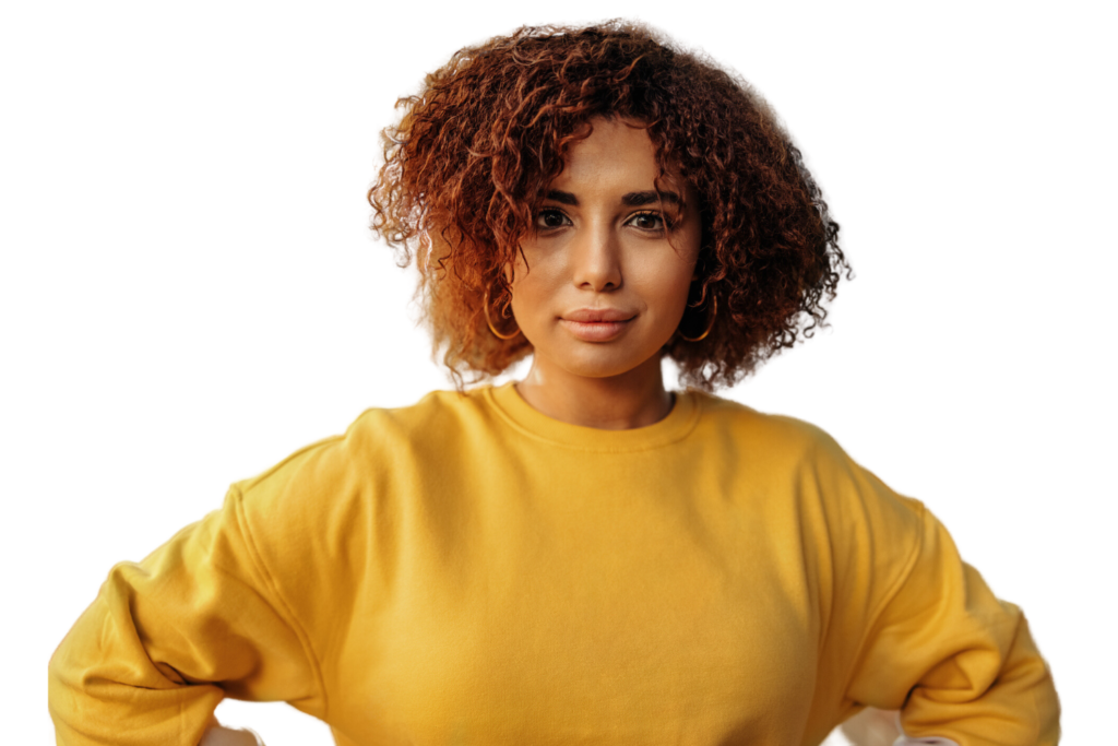 Young black woman in a yellow sweater, smiling - Embodying support and care at Problem Pregnancy Center, offering alternatives to abortion clinics in Detroit, Michigan.