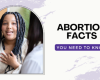 A young woman discussing abortion facts and options with an options counselor, highlighting the importance of visiting Problem Pregnancy Center before an abortion clinic in Southfield.