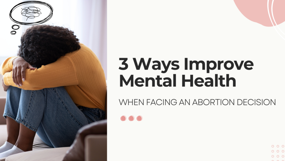 A woman in a yellow sweater sits on a couch with her head resting on her arms, appearing reflective and emotional. The text reads, "3 Ways to Improve Mental Health When Facing an Abortion Decision.