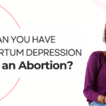 Concerned woman holding a tablet, appearing deep in thought. Text on image asks, 'Can You Have Postpartum Depression After an Abortion?' Discussing emotional effects of abortion in Southfield and Detroit, and available free pregnancy tests and ultrasounds.