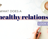 Notebook and coffee on a table with text asking, "What does a healthy relationship look like?"